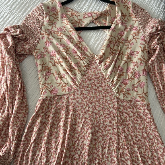 Free People dress size small stretchy material would fit a medium easily. - Picture 3 of 6
